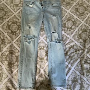 light blue ripped jeans